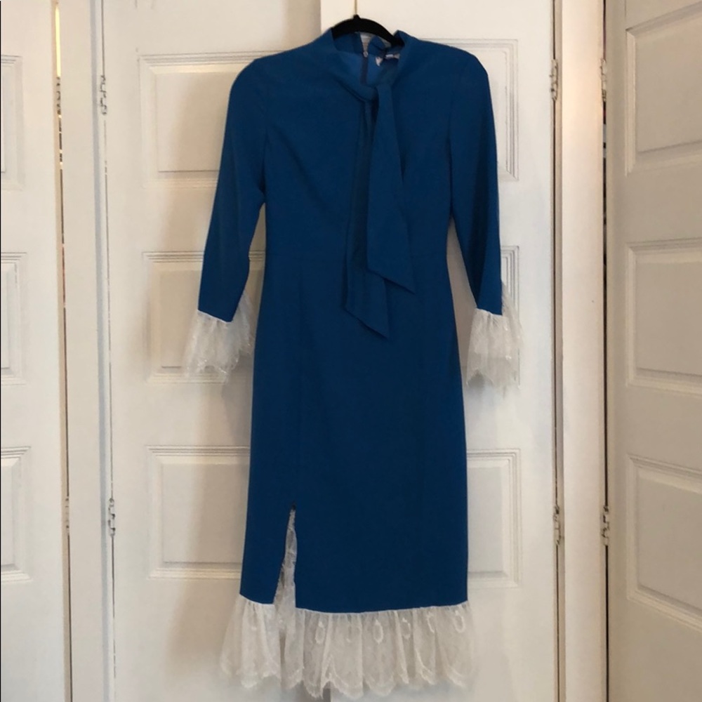 Blue dress with lace trim. New with tags